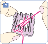 ピンに糸をかけます。